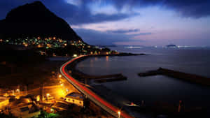 Coastal_ Nighttime_ Long_ Exposure Wallpaper