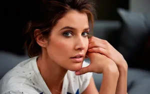 Cobie Smulders Posing In Front Of A Blue Background Wallpaper
