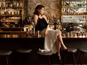 Cobie Smulders Striking A Pose In A Stylish Outfit Wallpaper