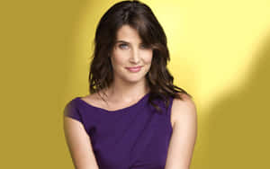 Cobie Smulders Striking A Pose In An Elegant Dress Wallpaper