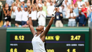 Coco Gauff Celebrating In Tennis Court Wallpaper