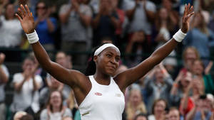 Coco Gauff Raised Hands Wallpaper