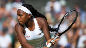 Coco Gauff With His Tennis Racket Wallpaper