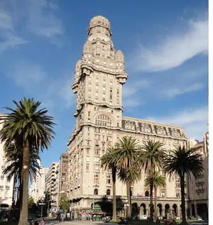 Coconut Trees In Front Of Palacio Salvo Wallpaper