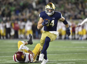 Cole Kmet Notre Dame Football Action Wallpaper