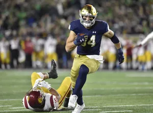 Cole Kmet Notre Dame Football Action Wallpaper