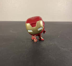 Collect And Display Your Favorite Iron Man Bobblehead Figures Wallpaper