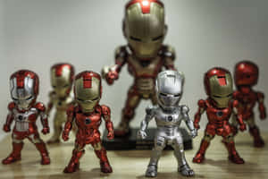 Collect And Display Your Love Of Iron Man With Action Figure Wallpaper