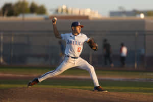 College Baseball Player In Action Wallpaper