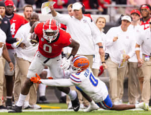 College Football Action Georgiavs Florida Wallpaper