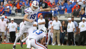 College Football Kicker Field Goal Attempt Wallpaper