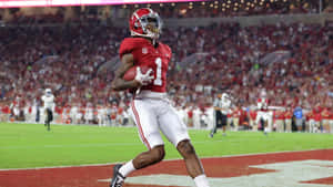 College Football Player Running With Ball Wallpaper