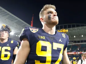 College Football Playoff Michigan Wolverines Aidan Hutchinson Wallpaper