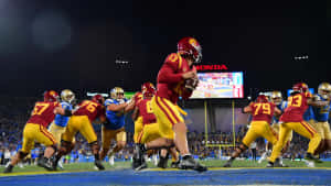 College Football Quarterback Action Wallpaper