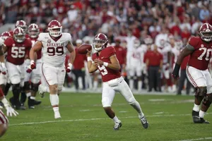 College Football Quarterback Action Wallpaper