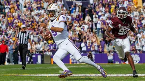 College_ Football_ Quarterback_ Action Wallpaper