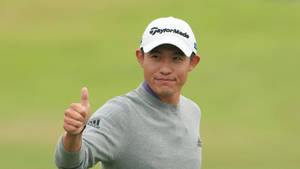 Collin Morikawa In His Thumbs-up Gesture Wallpaper