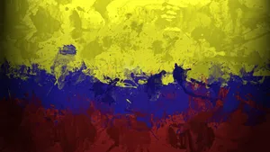 Colombia Flag Paint Splash Wallpaper