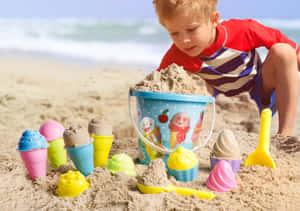 Colorful Beach Toys On A Sunny Day Wallpaper