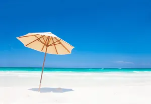 Colorful Beach Umbrella On A Sunny Day Wallpaper
