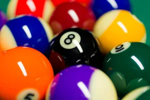 Colorful Billiard Ballswith Focuson Number Eight Wallpaper