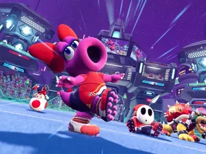 Colorful Birdo Character On A Pink Starry Background Wallpaper