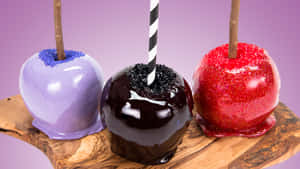 Colorful Candy Apples Display Wallpaper