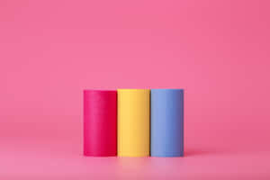 Colorful Cylinders Pink Background Wallpaper