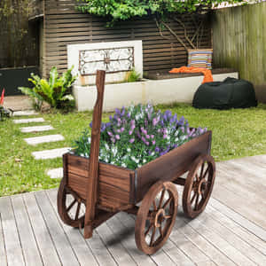 Colorful Flower Cart In A Garden Wallpaper