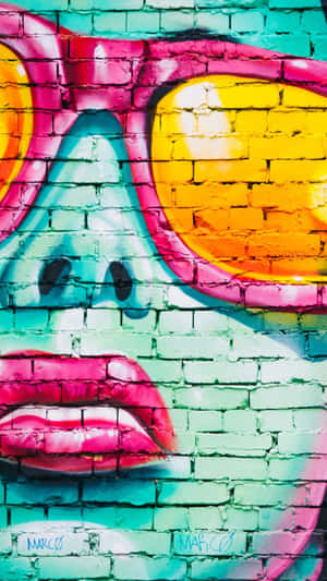 Colorful Graffiti Face Arton Brick Wall.jpg Wallpaper