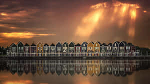 Colorful_ Houses_at_ Sunset_with_ Reflections.jpg Wallpaper