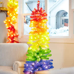 Colorful Indoor Christmas Tree Rainbow Lights Wallpaper