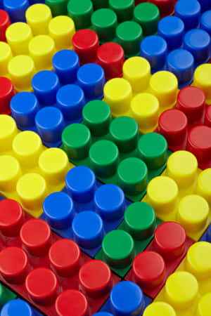 Colorful Lego Blocks On A Table Wallpaper