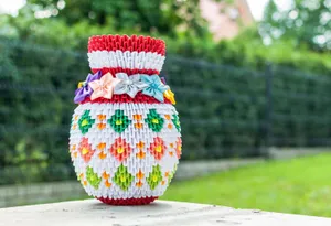 Colorful Origami Vasewith Decorative Bows Wallpaper