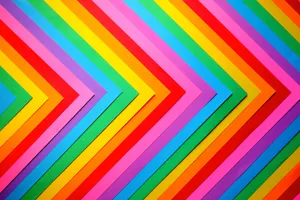 Colorful Paper Background With A Rainbow Arrow Wallpaper