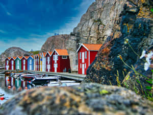Colorful Seaside Huts Sweden Wallpaper