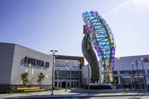 Colorful Shoe Sculptureat Shopping Mall Wallpaper