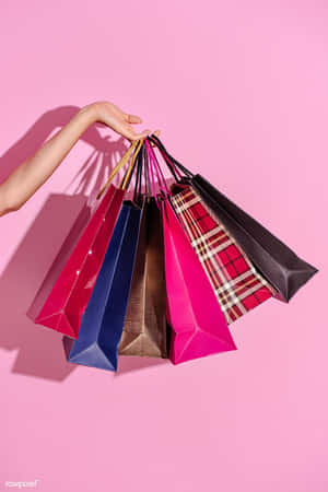 Colorful Shopping Bags Pink Backdrop Wallpaper