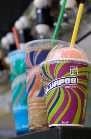 Colorful Slurpee Cups Display Wallpaper