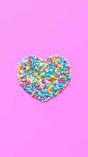 Colorful Sprinkles Hearton Pink Background Wallpaper