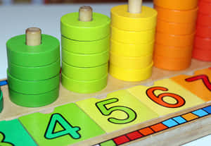 Colorful Stacking Rings Educational Toy Wallpaper