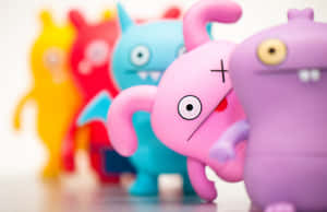 Colorful Vinyl Toy Figures Lineup Wallpaper