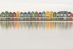 Colorful Waterfront Houses Reflection Wallpaper