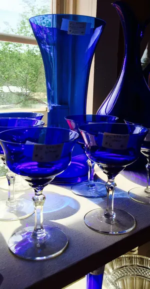 Colorful Waves Of Sunlight Reflecting Off The Cobalt Blue Water Wallpaper