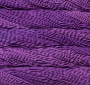 Colorful Yarn Skeins On Display Wallpaper