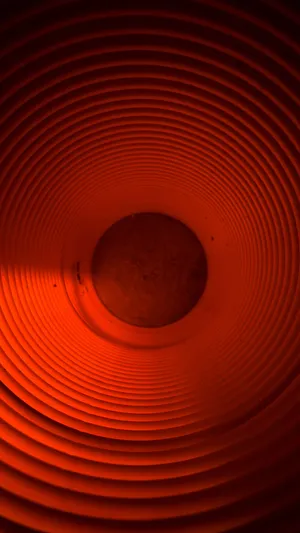 Colossal Mountain Range With Hints Of Green And Purple Wallpaper