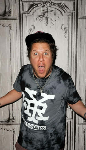 Comedian Nick Swardson Performing On Stage Wallpaper