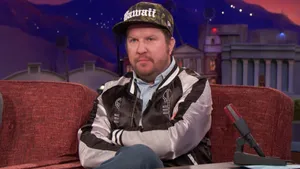 Comedian Nick Swardson Performing On Stage Wallpaper
