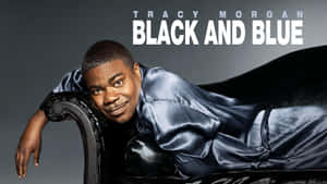 Comedian Tracy Morgan Smiling At A Red Carpet Event Wallpaper