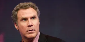 Comedian Will Ferrell Striking A Humorous Pose Wallpaper